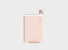 Viral slim clear waterbottle in a neutral pink silicone sleeve and nude pink lid in size A5.