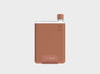 On trend slim clear waterbottle in a light brown silicone sleeve and neutral brown lid in size A5.