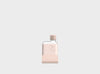 Viral slim clear waterbottle in a neutral pink silicone sleeve and nude pink lid in size A7.