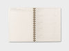 Wire-bound Daily Planner showing 12 month plan layout for Work breakdown of goals and tasks