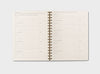 Wire-bound Daily Planner showing 90 day plan layout for Life and work breakdown of goals and tasks