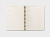Wire-bound Daily Planner showing Monthly plan layout for Life breakdown of goals and tasks