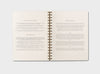 MOXON wire-bound planner open spiral-bound notebook with text explaining why we designed it and how it works